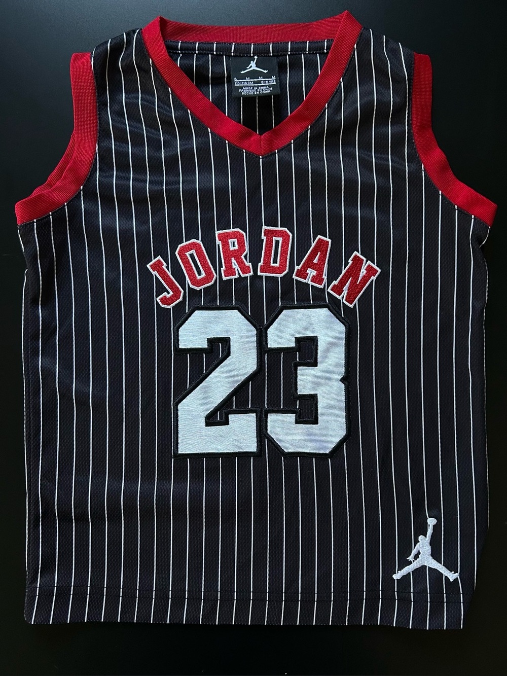 Kids Boys Jordan 23 Black Pinstripe Basketball Jersey with Red Trim